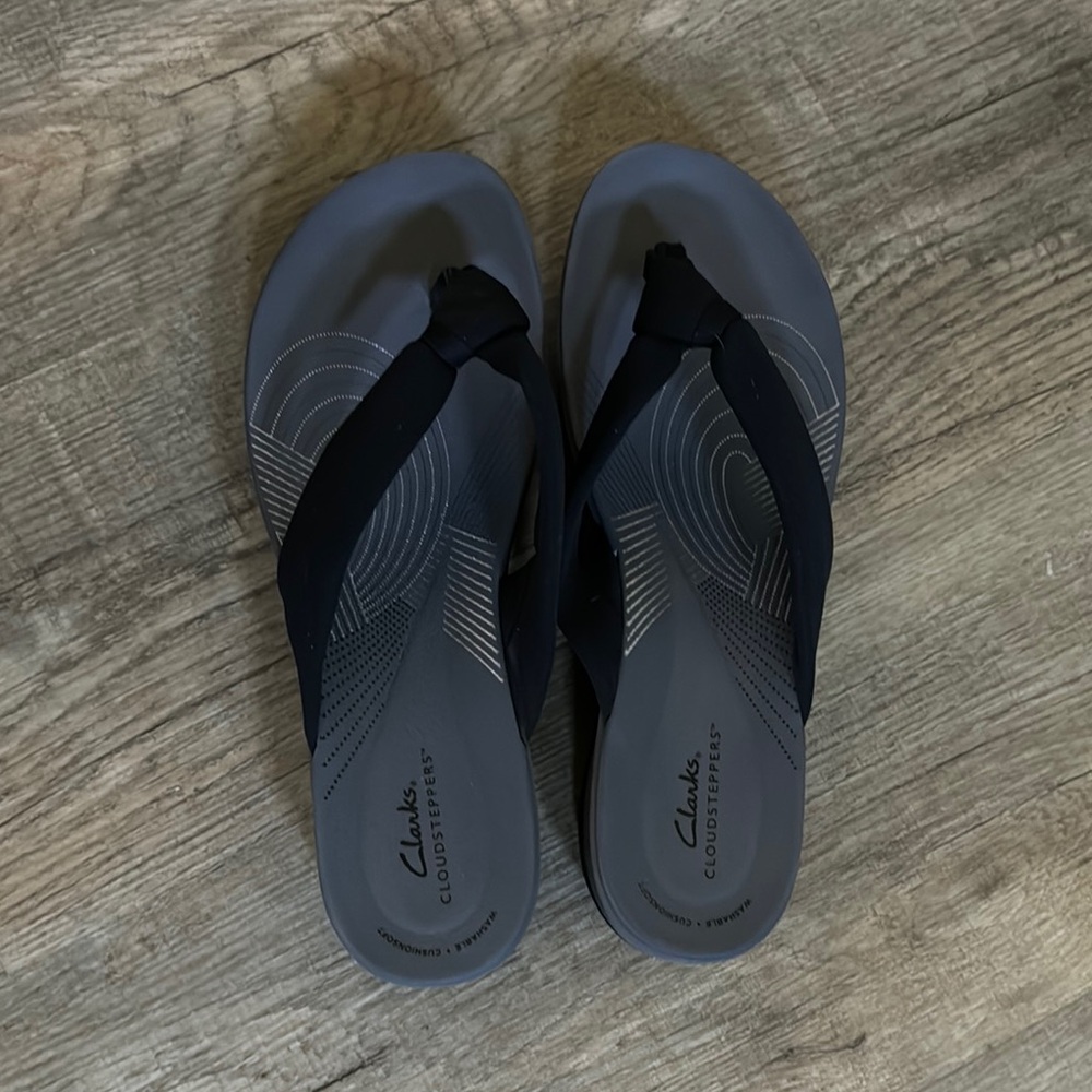 NEW! Clarks Cloudsteppers Black Sandals. Wedge heel. Size 12M